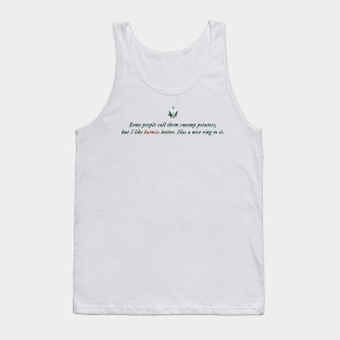 Some people call them swamp potatoes, but I like katniss better. Tank Top